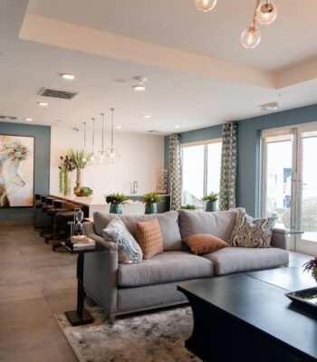 black wooden coffee table near white couch